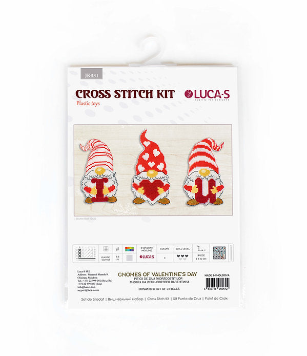 Gnomes of Valentine's Day cross-stitch kit featuring colorful threads, needle, and Aida canvas.