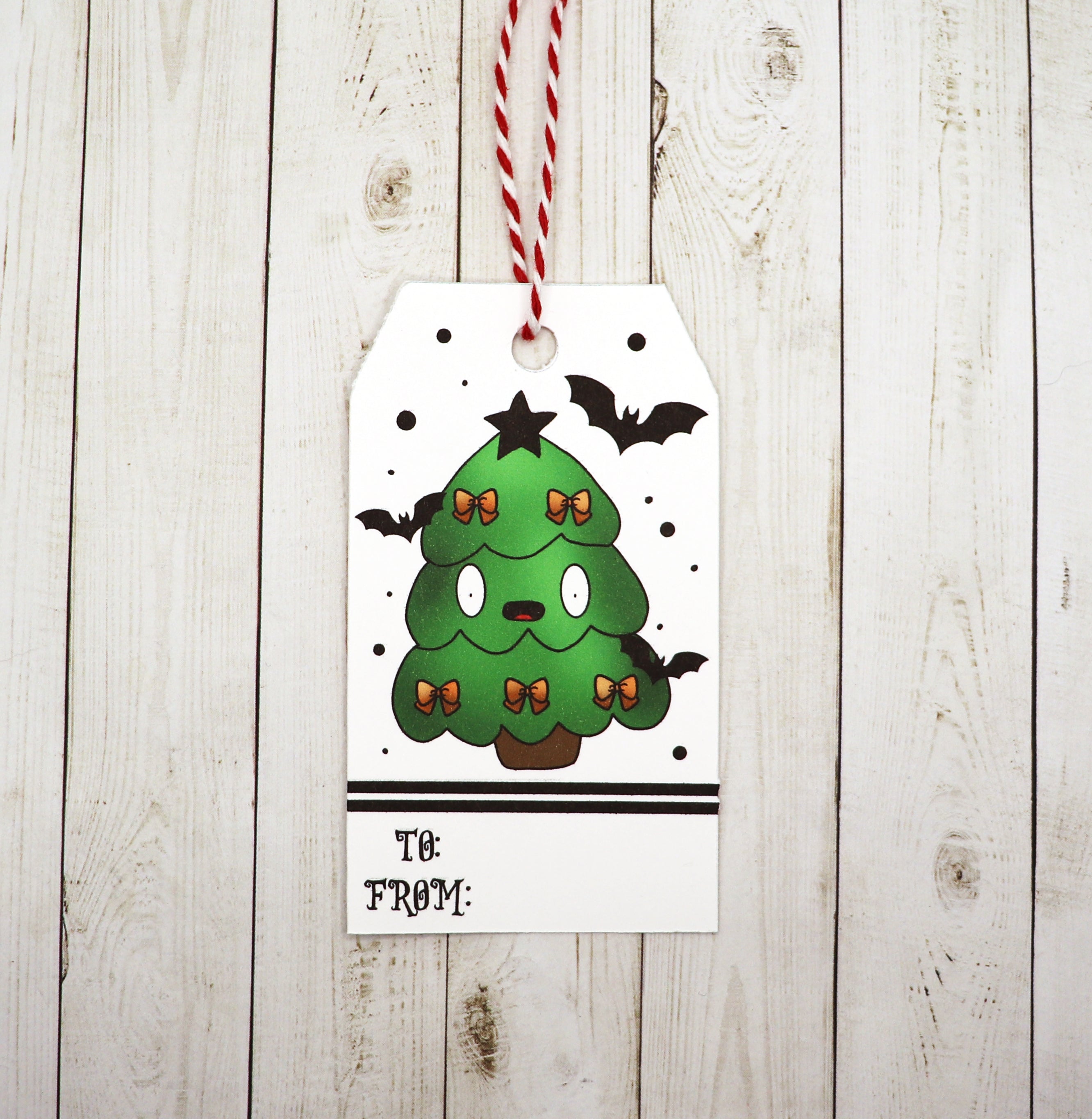 Gothic Christmas Tree Gift Tags featuring a unique design, red and white twine, and printed on heavy white cardstock.