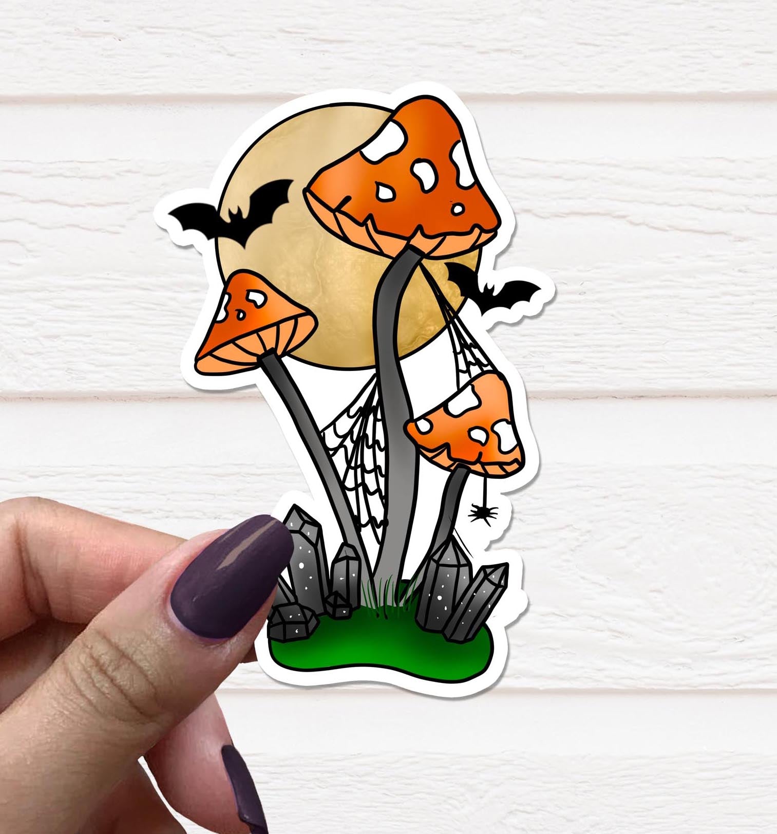 A vibrant Halloween Mushroom Vinyl Sticker featuring a whimsical mushroom design, perfect for decorating various items.