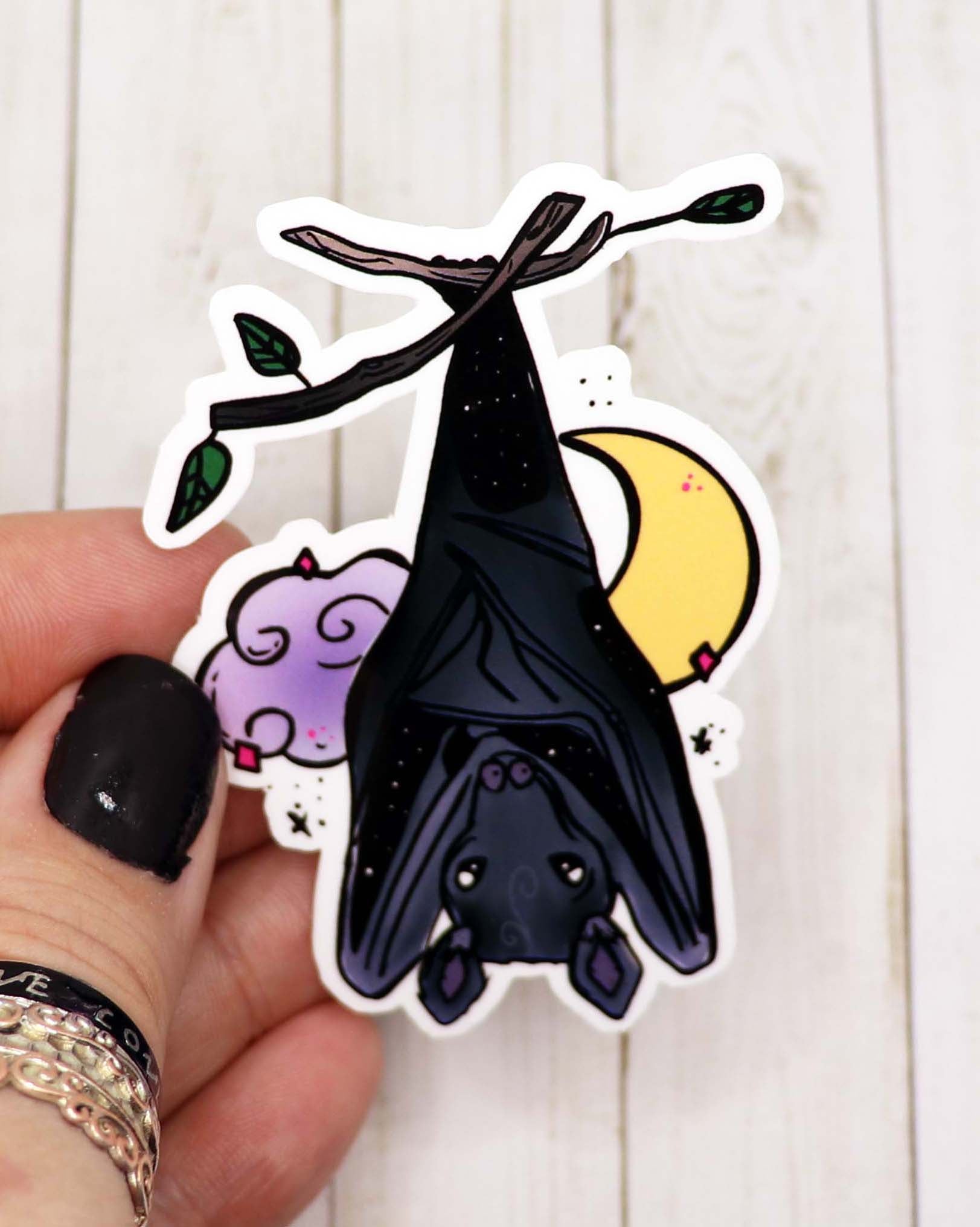 A stylish Hanging Bat Vinyl Sticker featuring a bat design on high-quality matte vinyl, perfect for personalizing various items.