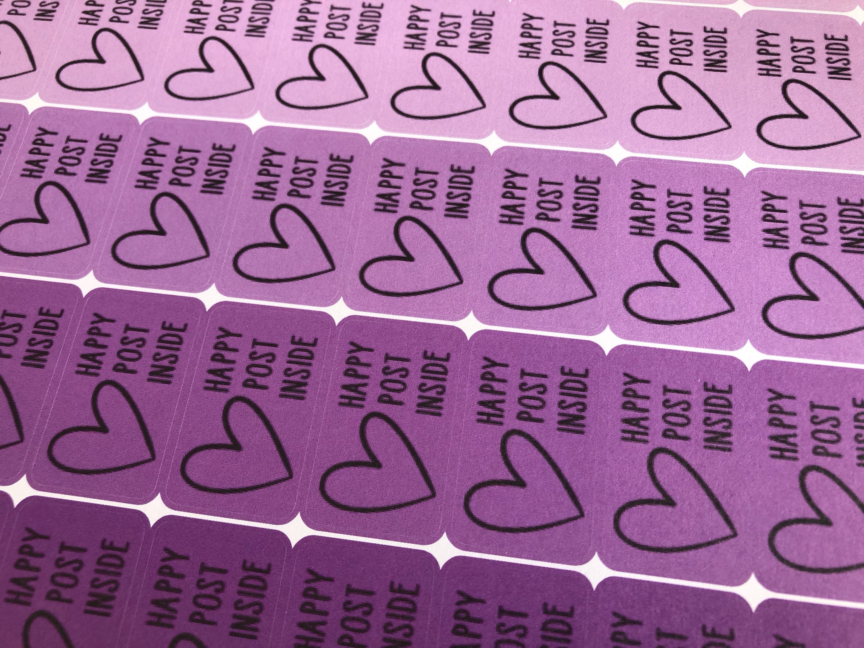 A collection of Happy Post Stickers - Seconds featuring cheerful designs with slightly pixelated text, perfect for crafting and correspondence.