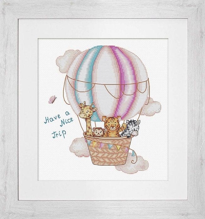 Have a Nice Trip B1191L Counted Cross-Stitch Kit featuring cartoon animals in an air balloon, ideal for nursery decor.