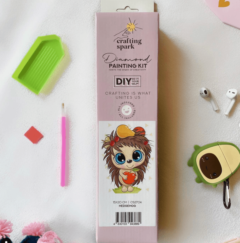 Hedgehog CS2704 Crafting Spark Diamond Painting Kit with tools and pre-sorted acrylic diamonds displayed on a table.
