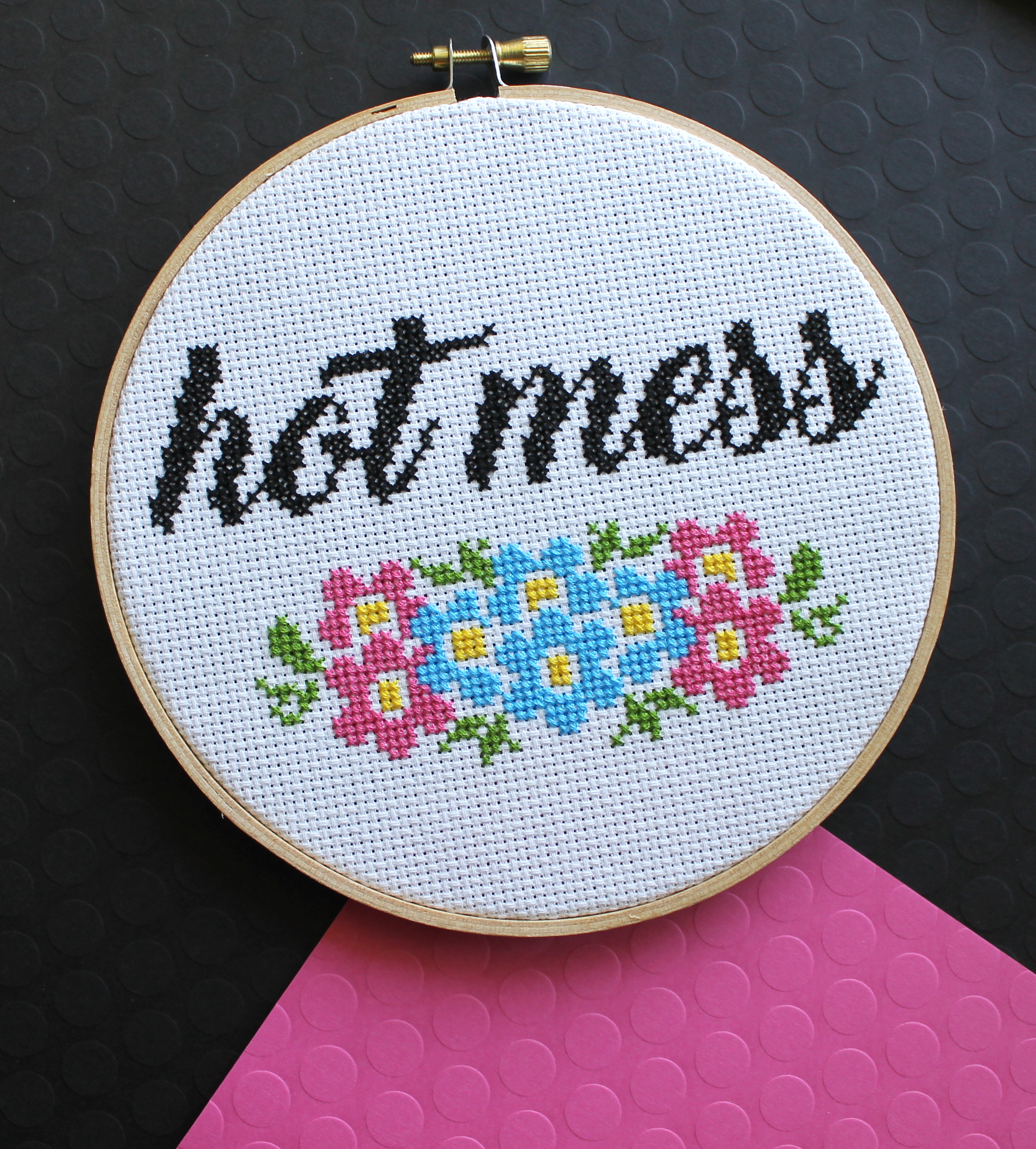 Hot Mess Counted Cross Stitch DIY Kit featuring floral elements and the phrase 'hot mess', designed for intermediate stitchers.