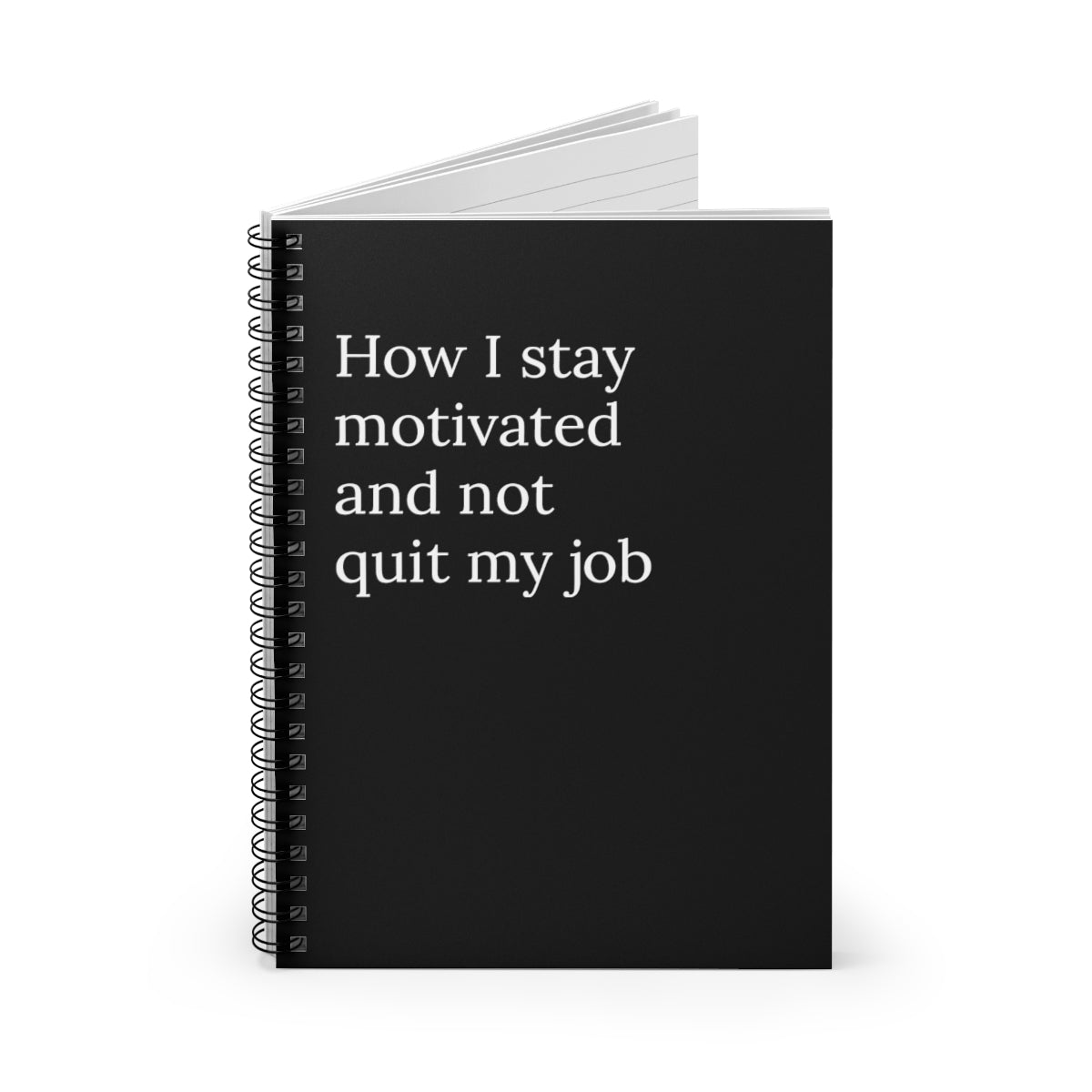 A humorous spiral notebook titled 'How I Stay Motivated and Not Quit My Job' featuring a funny design, ideal for office use.