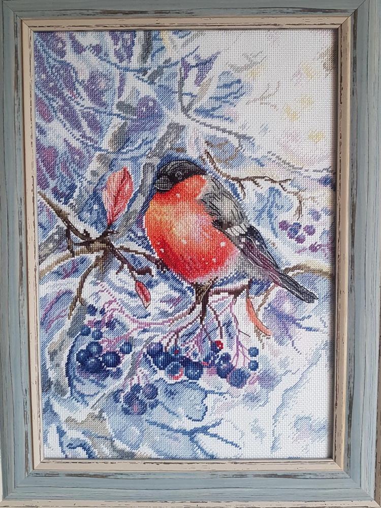 In the Snowing Forest SNV-665 Counted Cross Stitch Kit featuring 31 colors of cotton threads and 18 count AIDA canvas.