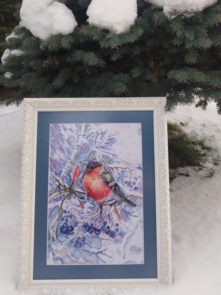 In the Snowing Forest SNV-665 Counted Cross Stitch Kit featuring 31 colors of cotton threads and 18 count AIDA canvas.