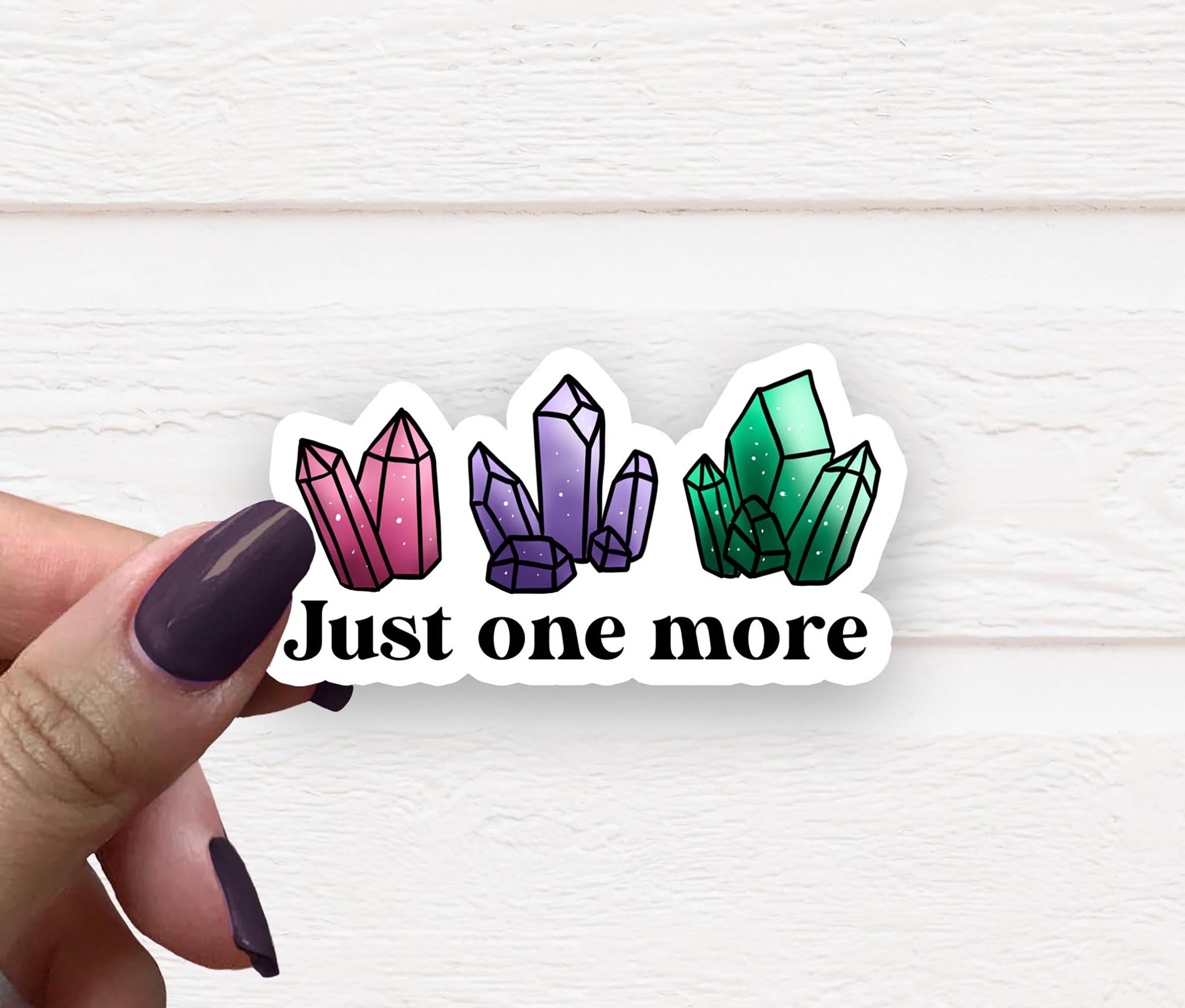 Just One More Crystal Vinyl Sticker on a white background, showcasing its vibrant design and matte finish.