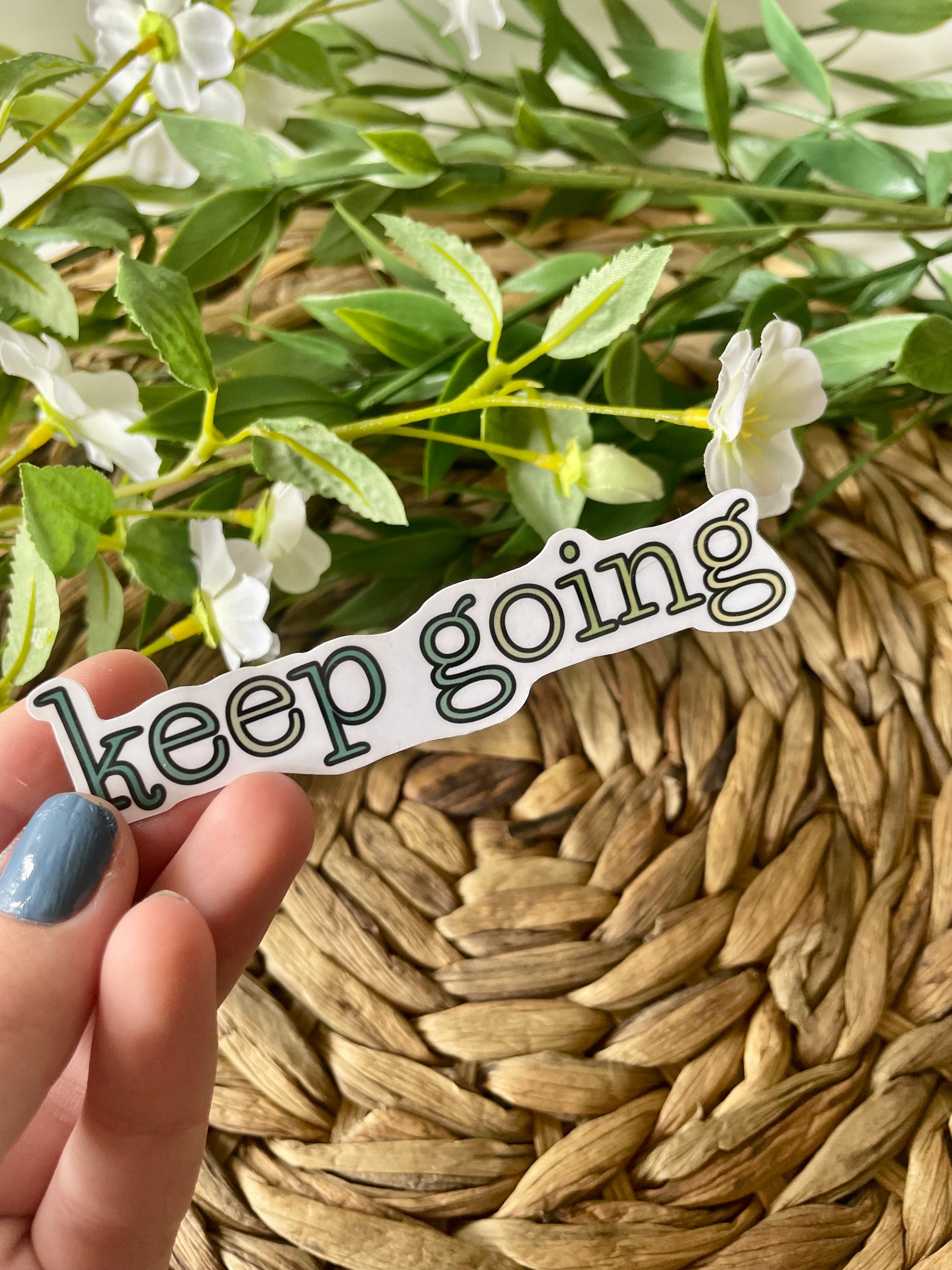 A cute aesthetic Keep Going sticker featuring a motivational design, perfect for personalizing laptops and water bottles.