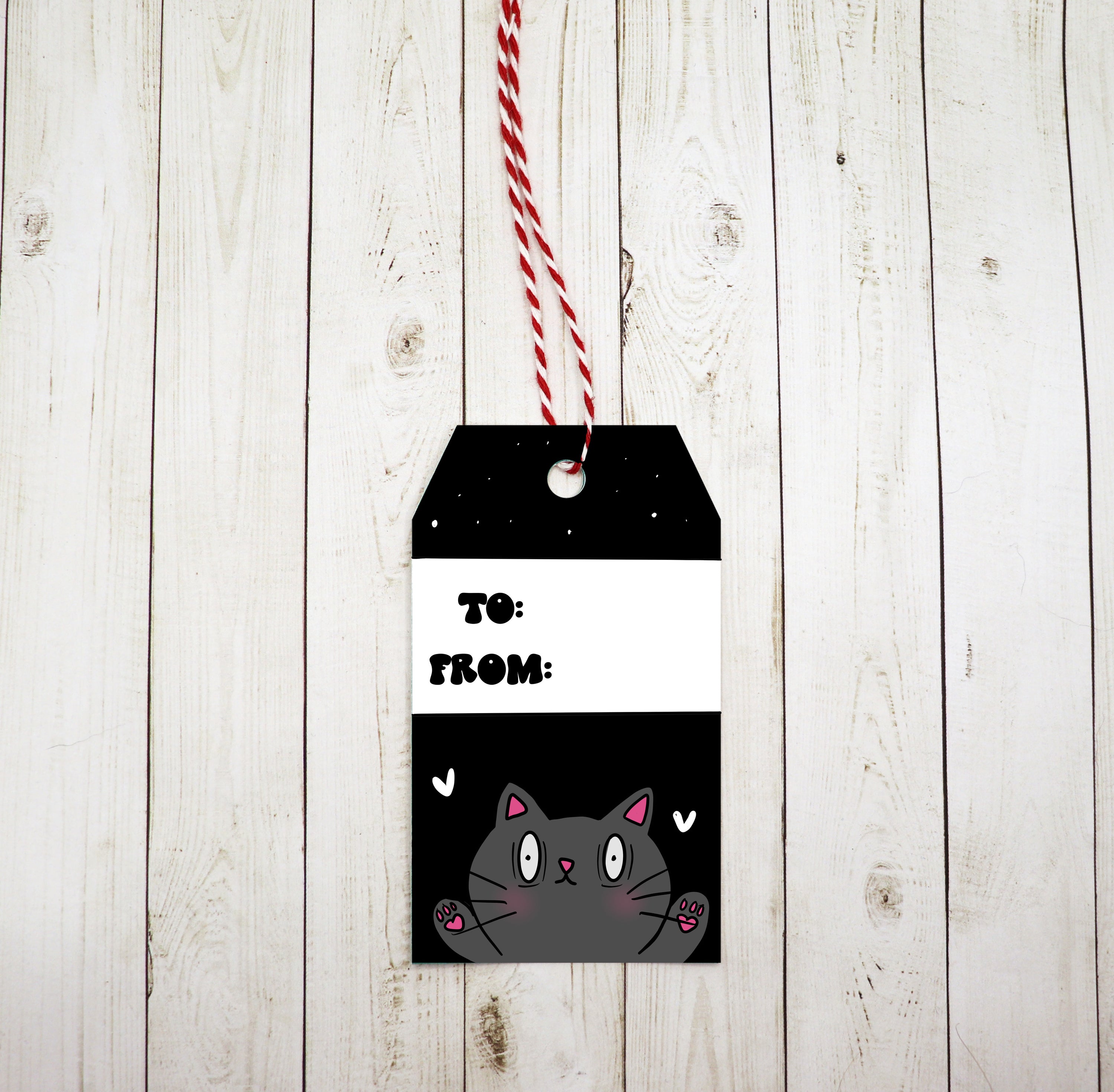 A set of 8 adorable kitty gift tags featuring a charming design, printed on heavy white cardstock with red and white twine included.