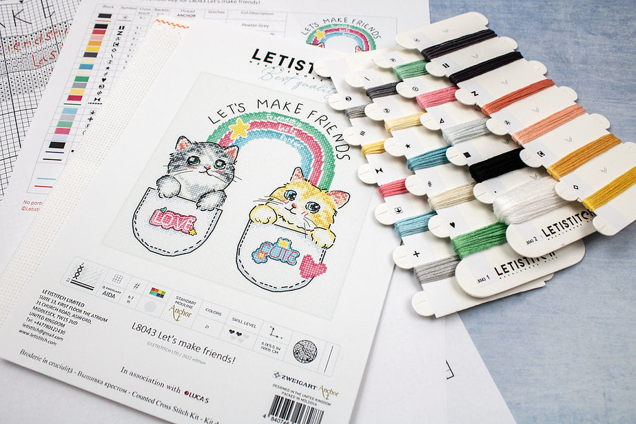 Let's Make Friends! L8043 Counted Cross Stitch Kit featuring colorful threads, canvas, and instruction chart.