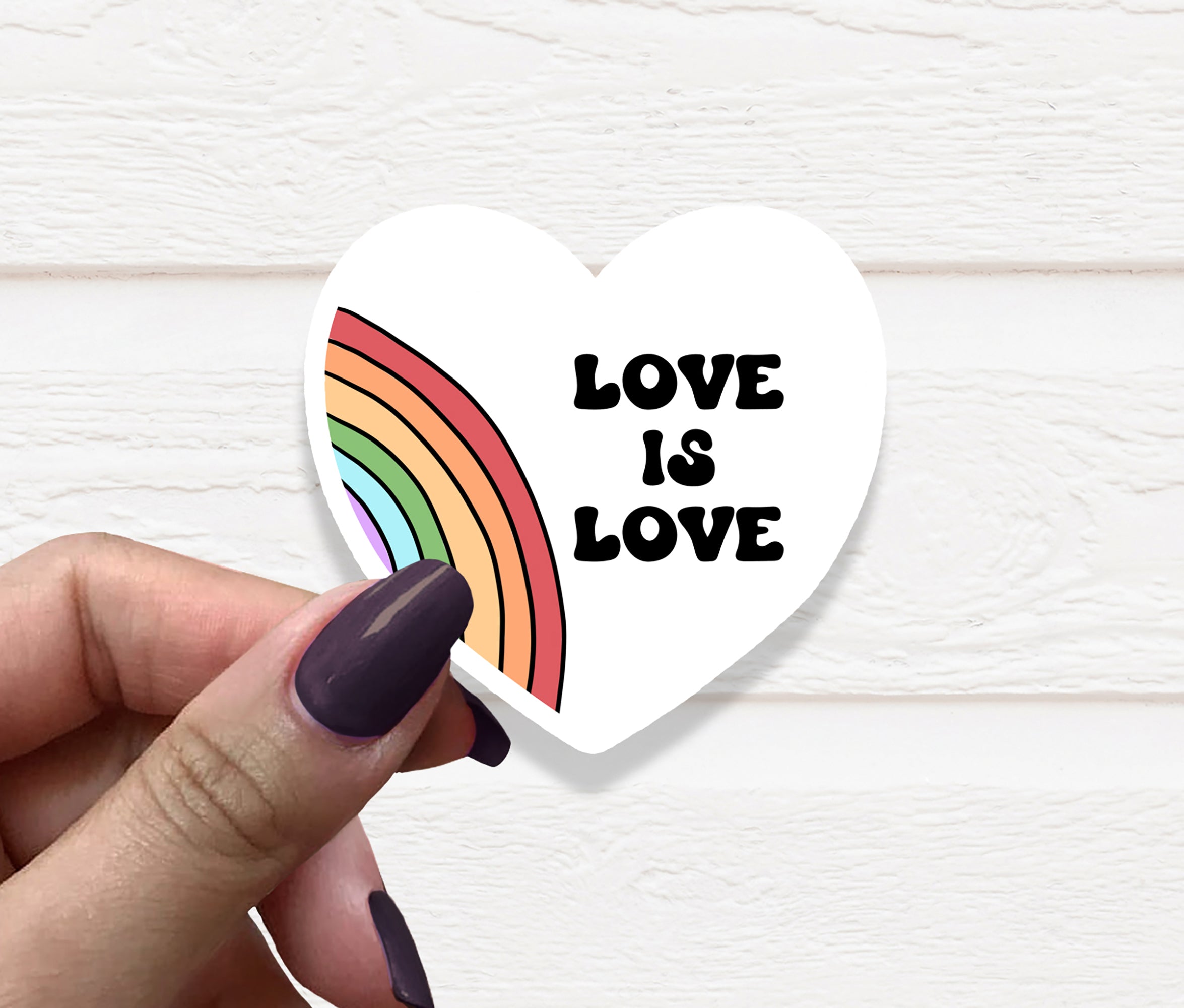 Colorful Love is Love Heart Vinyl Sticker on a white background, showcasing vibrant colors and a heart design.