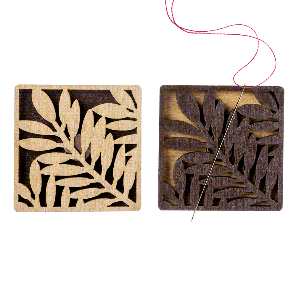 Magnetic double-sided needle holder FLMH-056(W) with strong neodymium magnets, elegantly designed for embroidery enthusiasts.