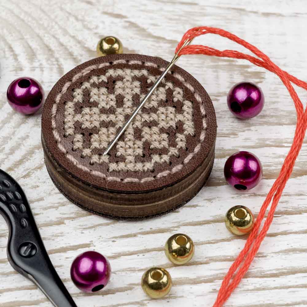 Magnetic Needle Holder Making Kit FLTL-042 with components including leather blanks, plywood magnets, needle, and threads.