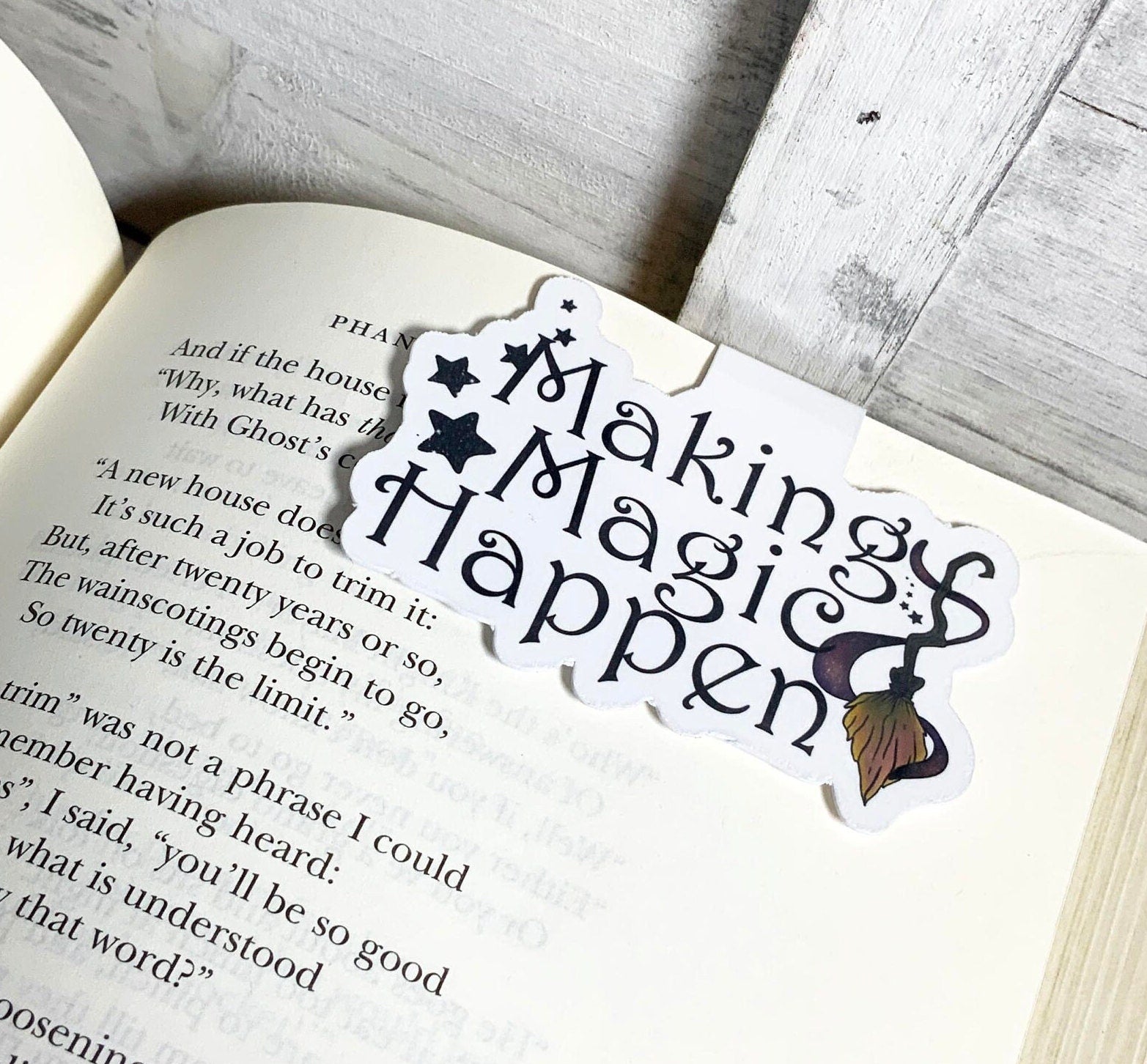 A vibrant Making Magic Happen Magnetic Bookmark featuring a whimsical design, measuring 3 inches wide by 2 inches tall, with strong magnets.