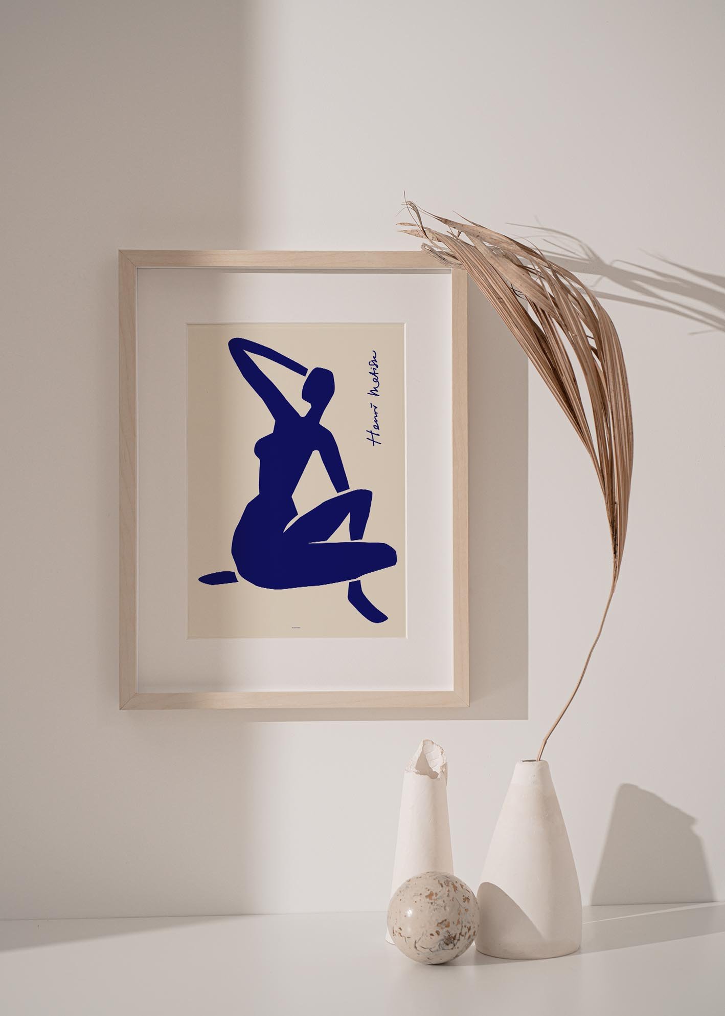 Art print of Matisse Blue Nude collection featuring colorful paper cutouts inspired by Henri Matisse's unique artistic style.