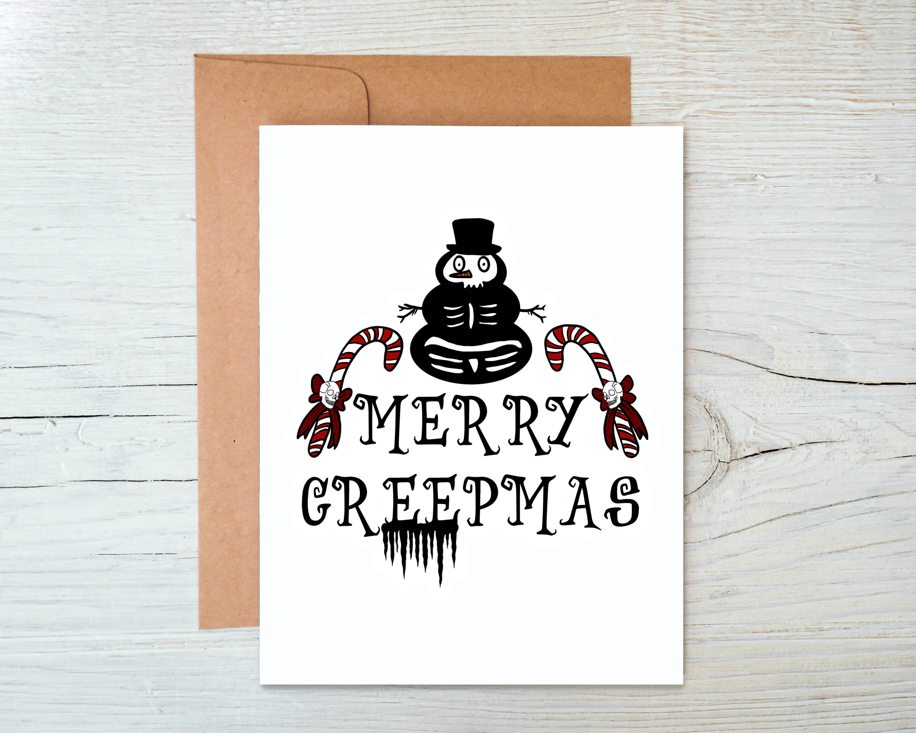 Merry Creepmas card featuring a blank interior and kraft envelope, designed for unique holiday greetings.