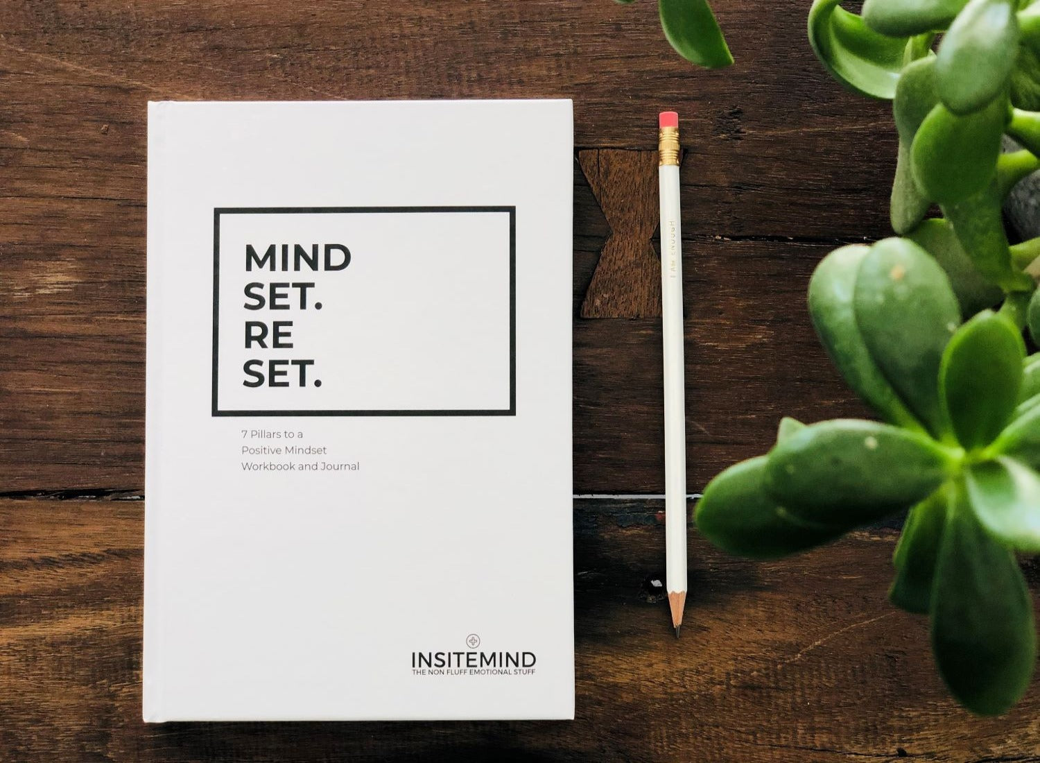 Mindset Reset Workbook and Journal featuring a beautiful cover design, open to a page with guided exercises and reflections.