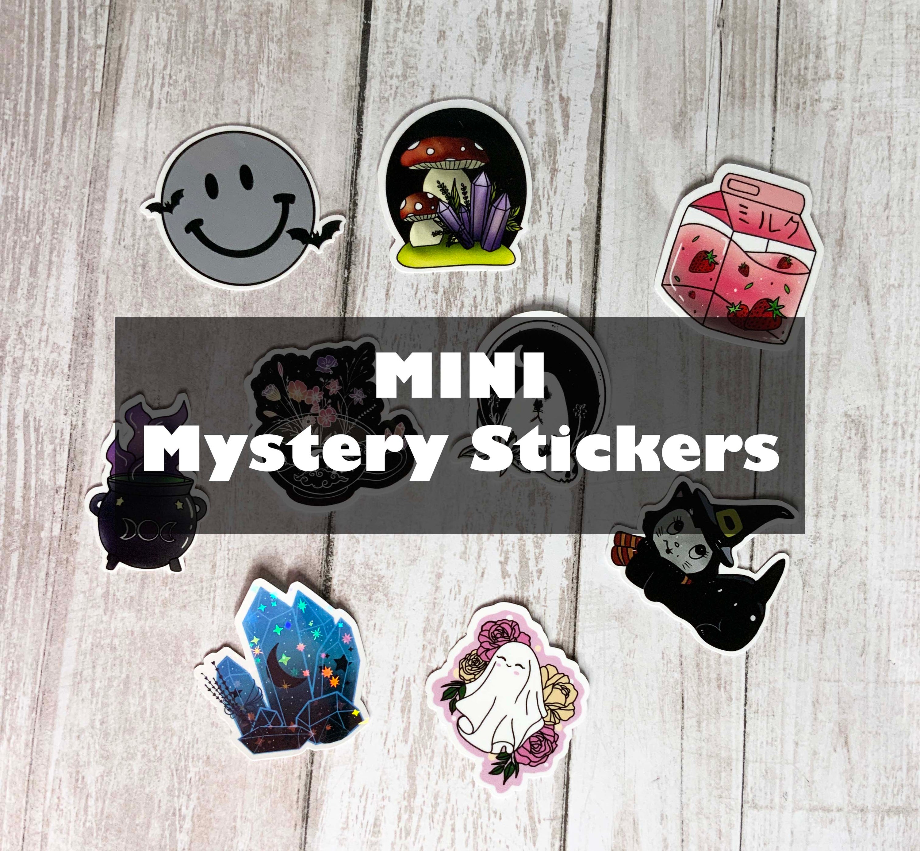A colorful assortment of MINI Mystery Stickers featuring witchy, gothic, and cottagecore designs, displayed on a flat surface.
