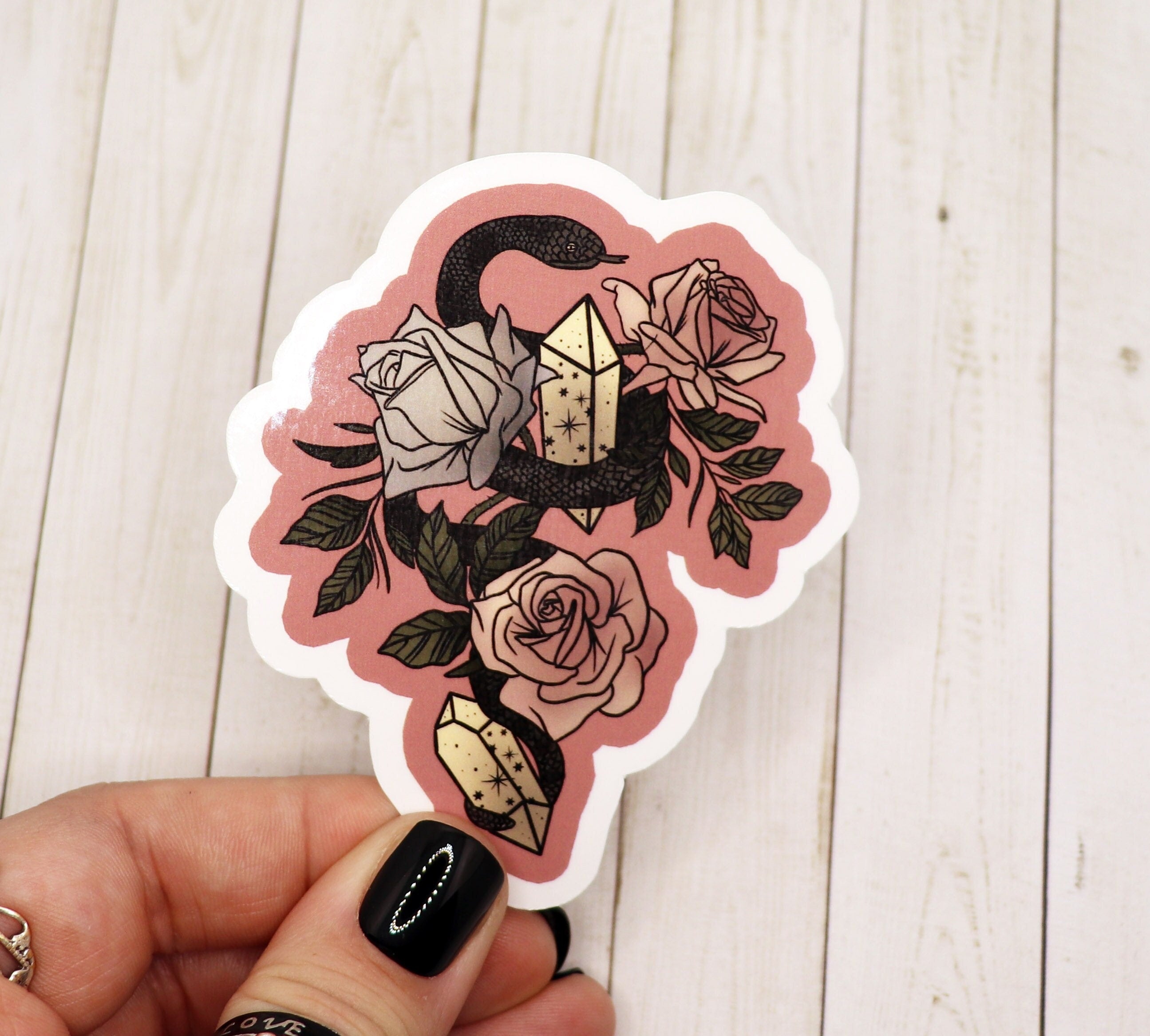 A stylish Momento Mori Snake Sticker featuring a snake design on matte vinyl, perfect for personalizing various items.