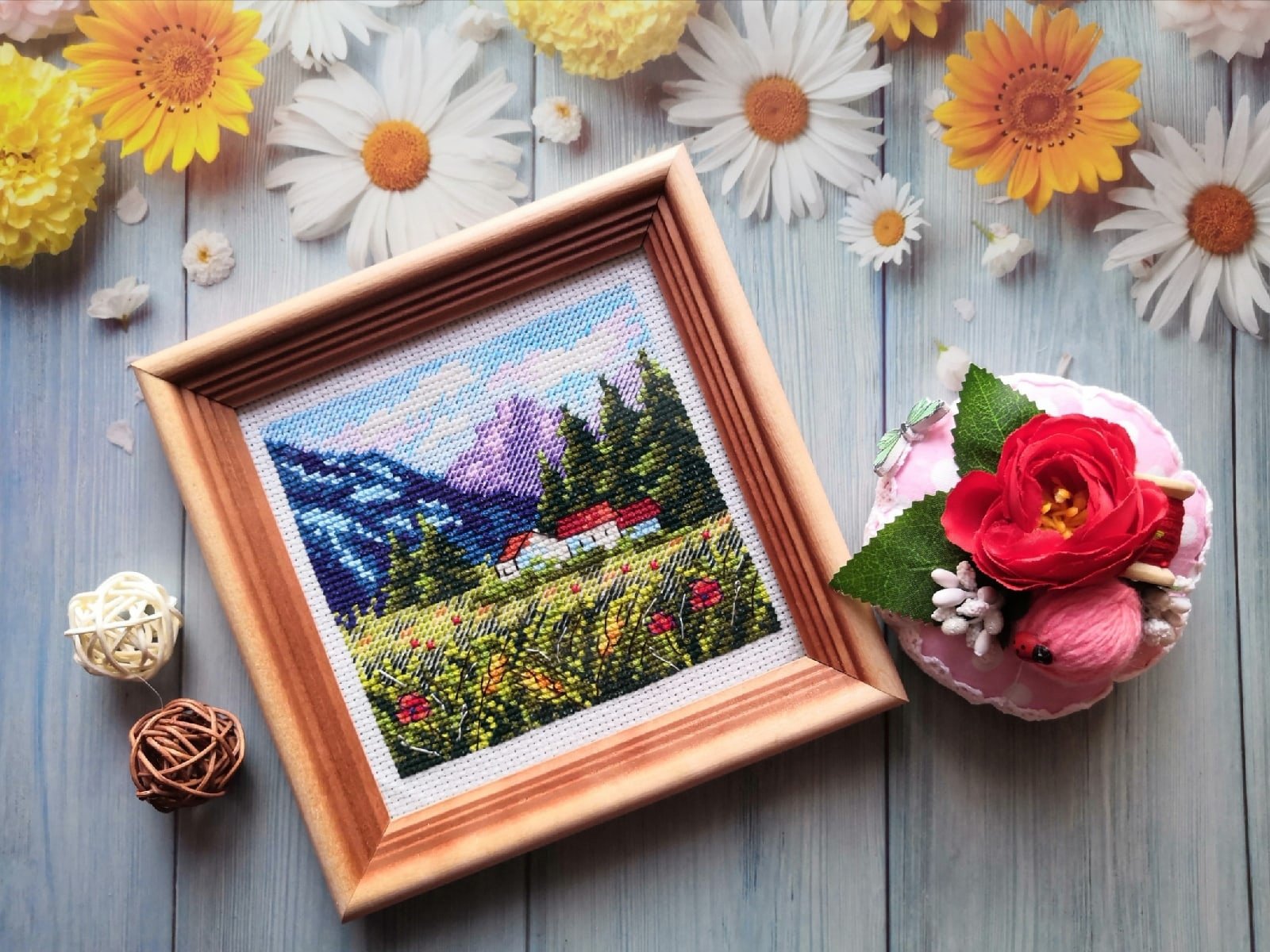 Mountain Landscape SM-614 Counted Cross Stitch Kit featuring Aida canvas, colorful threads, and needle for stitching.