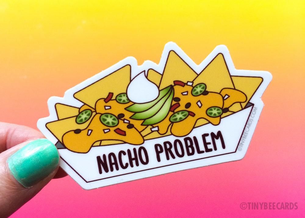 A colorful vinyl sticker featuring a plate of nachos with the pun 'Nacho Problem' designed for personalizing items.