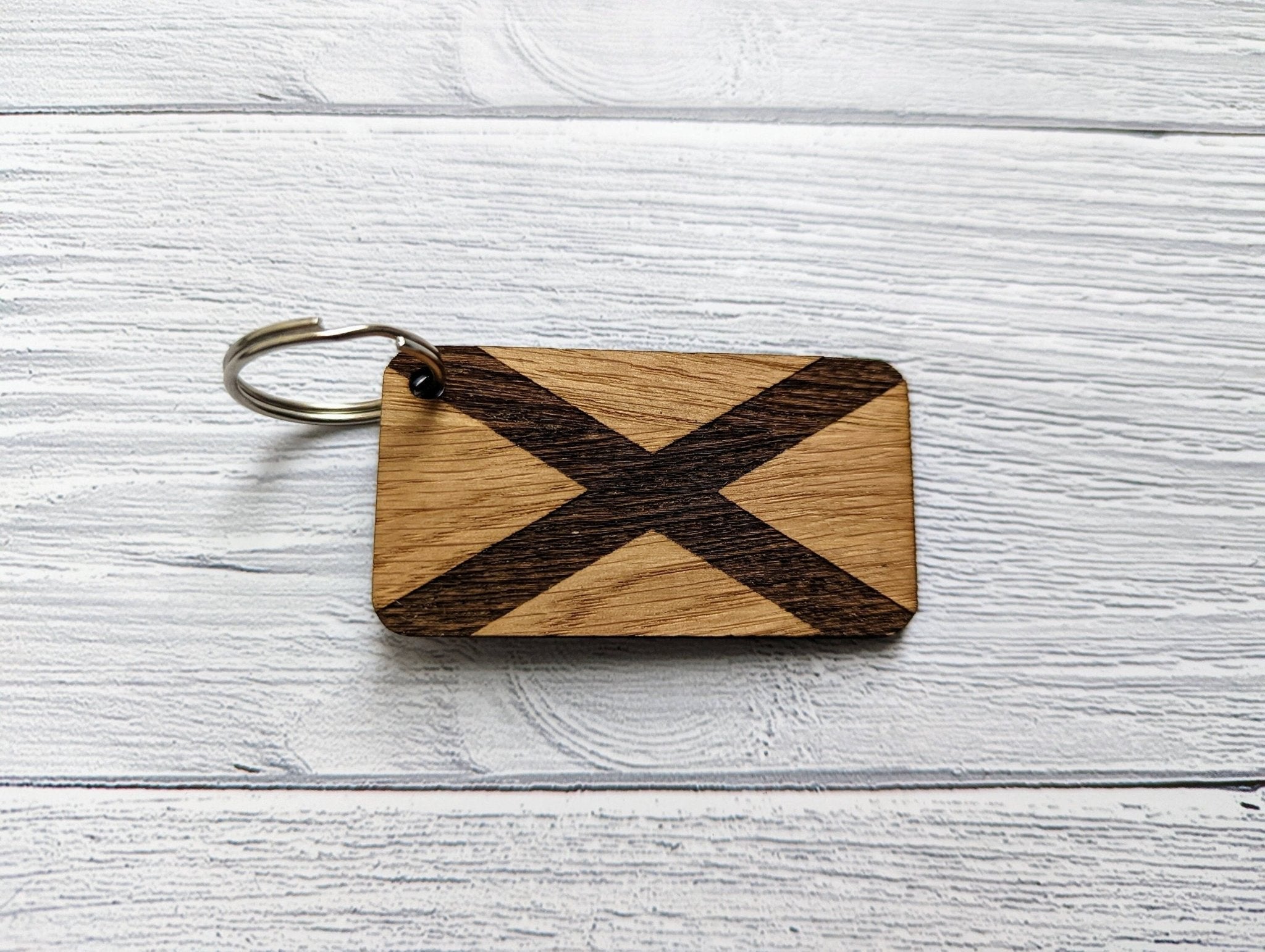 Northern Ireland Flag Keyring made from oak MDF, featuring laser engraved design, showcasing the vibrant colors of the flag.