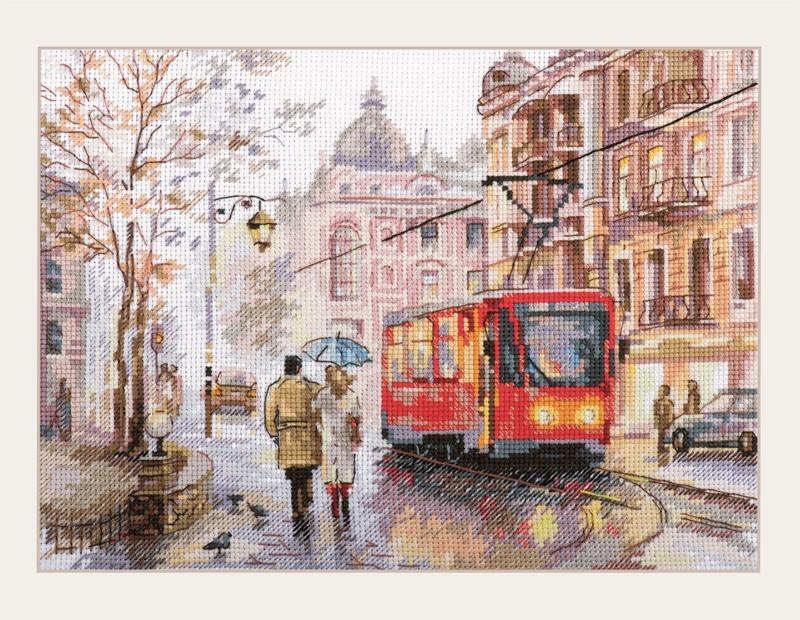 October in the City cross-stitch kit featuring white aida fabric, colorful threads, and an embroidery needle.