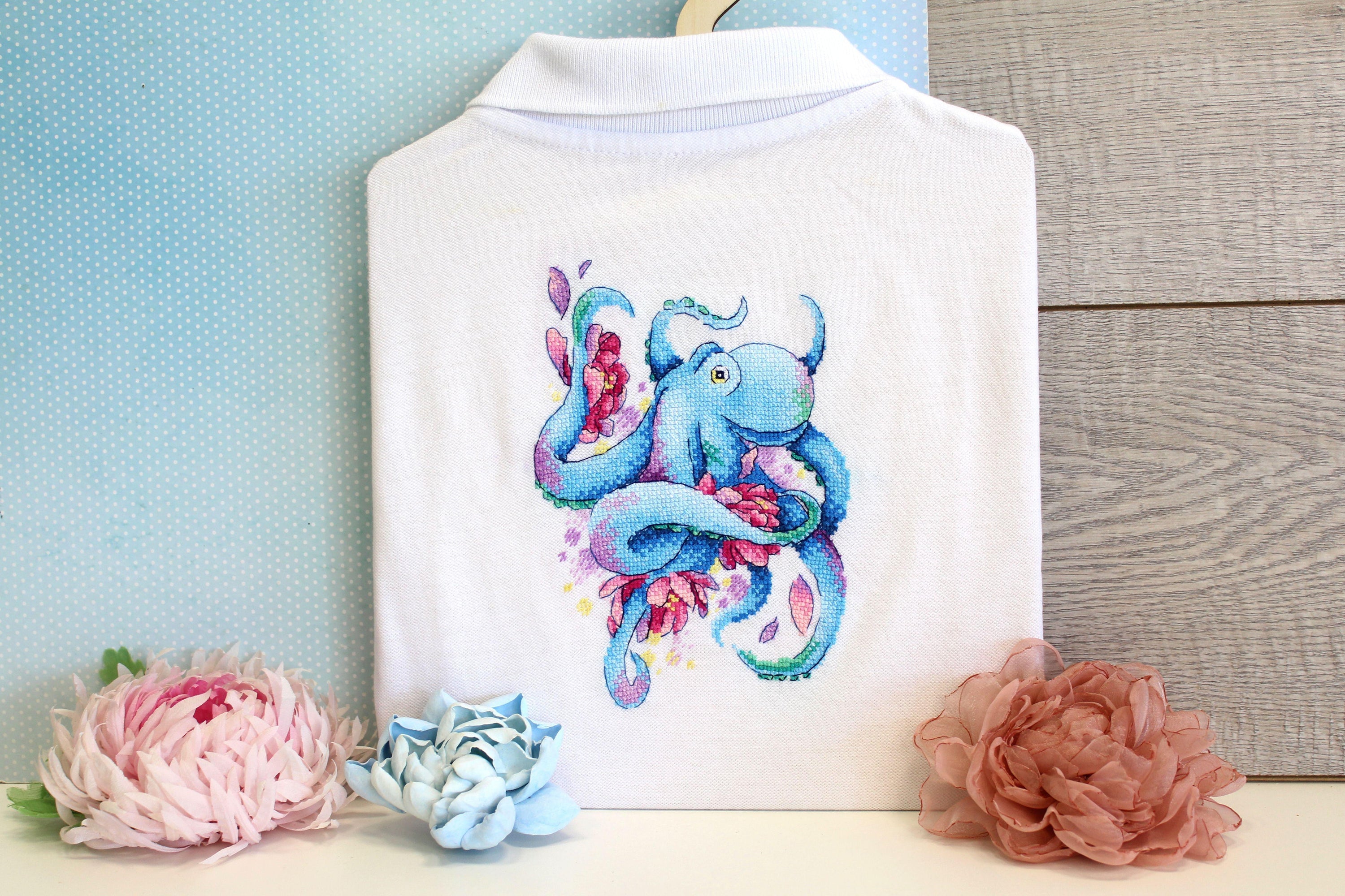 Octopus SV-548 Counted Cross Stitch Kit featuring water-soluble AIDA canvas, colorful threads, and a needle, designed by Anzhelika Ivanova.