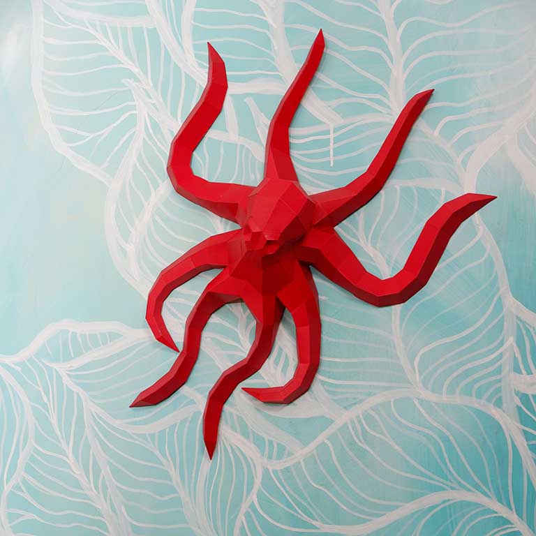 Colorful Octopus Wall Art made from pre-cut, eco-friendly paperboard, showcasing intricate design and vibrant colors.