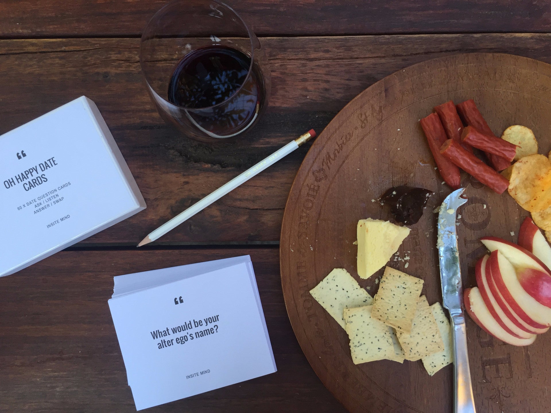 A colorful box of Oh Happy Date Cards featuring 100 engaging prompts for fun date nights and gatherings.