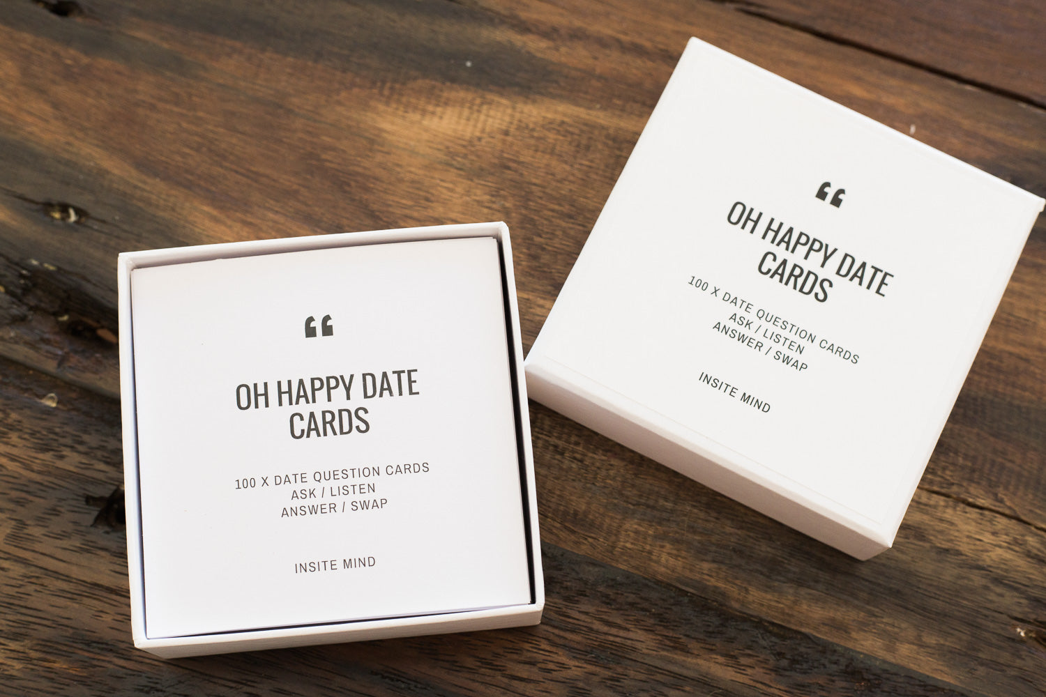 A colorful box of Oh Happy Date Cards featuring 100 engaging prompts for fun date nights and gatherings.