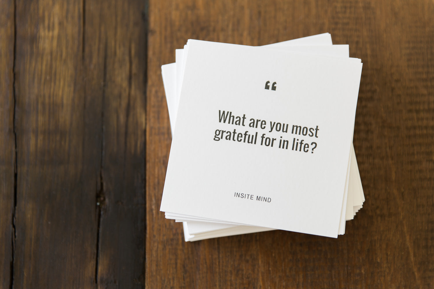 A colorful box of Oh Happy Date Cards featuring 100 engaging prompts for fun date nights and gatherings.