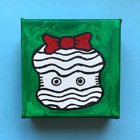 Cartoon drawing of a cupcake.