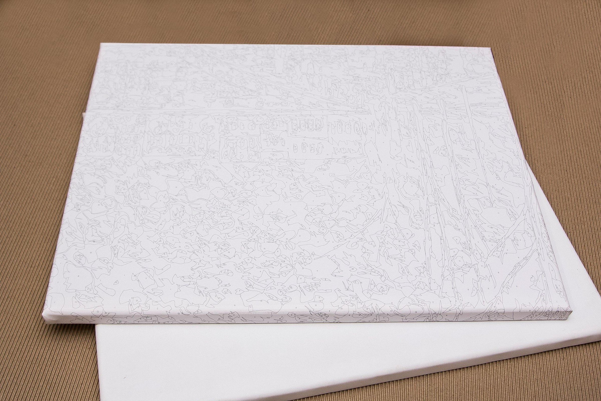 Painting by Numbers kit July KHO3134 featuring a natural canvas, acrylic paints, and brushes for creating beautiful artwork.