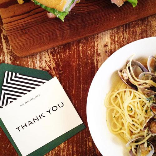 Elegant Personal Note Thank You Card with black foil accents and lined envelope, showcasing a stylish design.