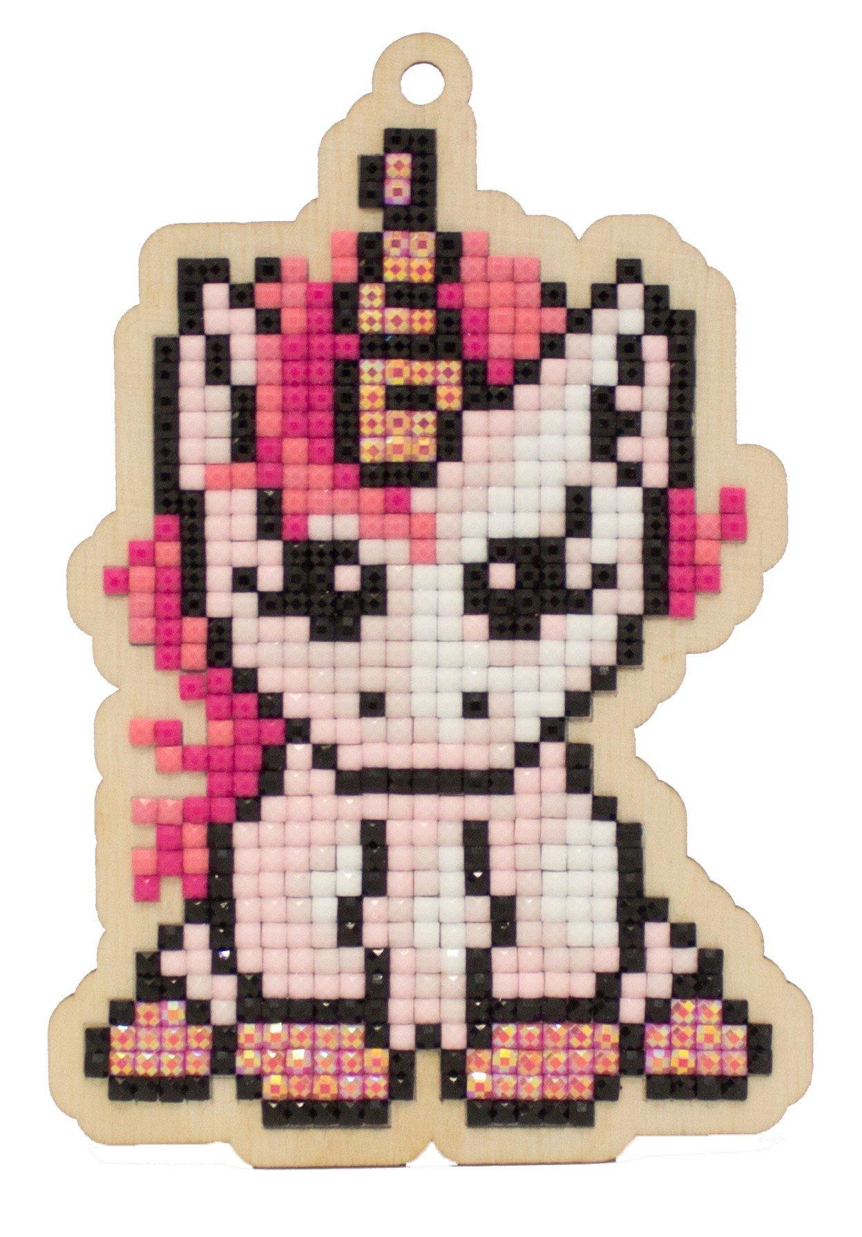 Pink Unicorn CSw338 Diamond Painting Kit on plywood with colorful rhinestones and crafting tools.