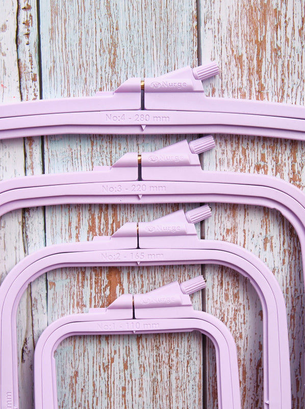 Nurge 170-12 Pastel Lilac Square Hoop, measuring 145mm x 165mm, designed for embroidery and needlecraft with a notch and groove mechanism.