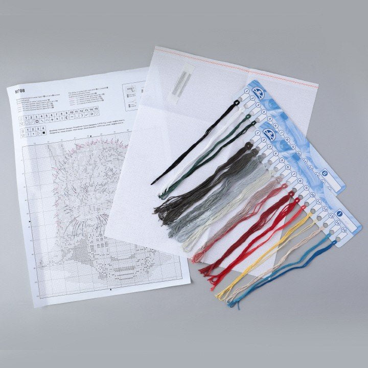 Playful Kitten M708 Counted Cross Stitch Kit with colorful threads and Aida fabric.