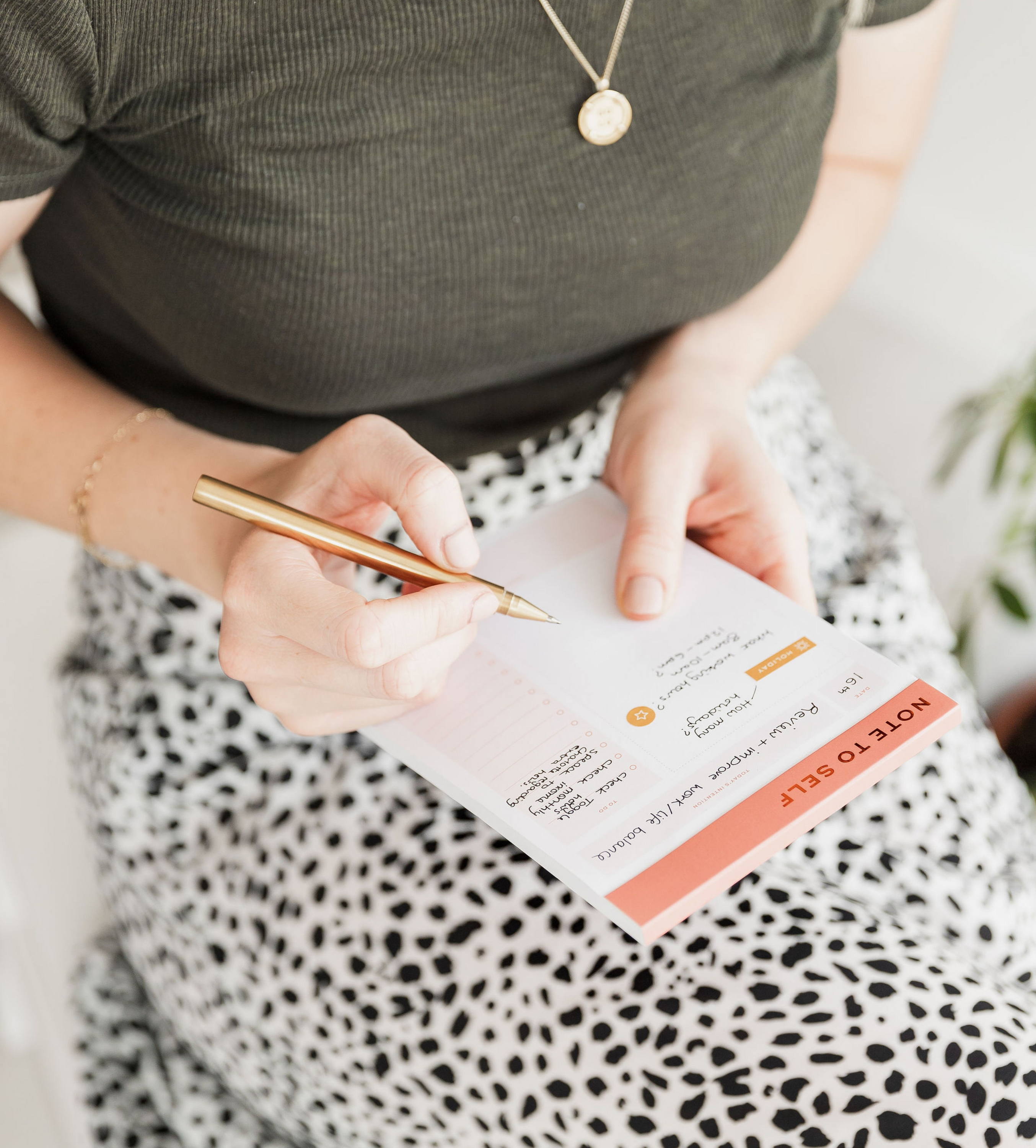 Ponderlily® Weekly Planner 2023 in Grey with copper foiled lettering, showcasing its elegant design and eco-friendly materials.