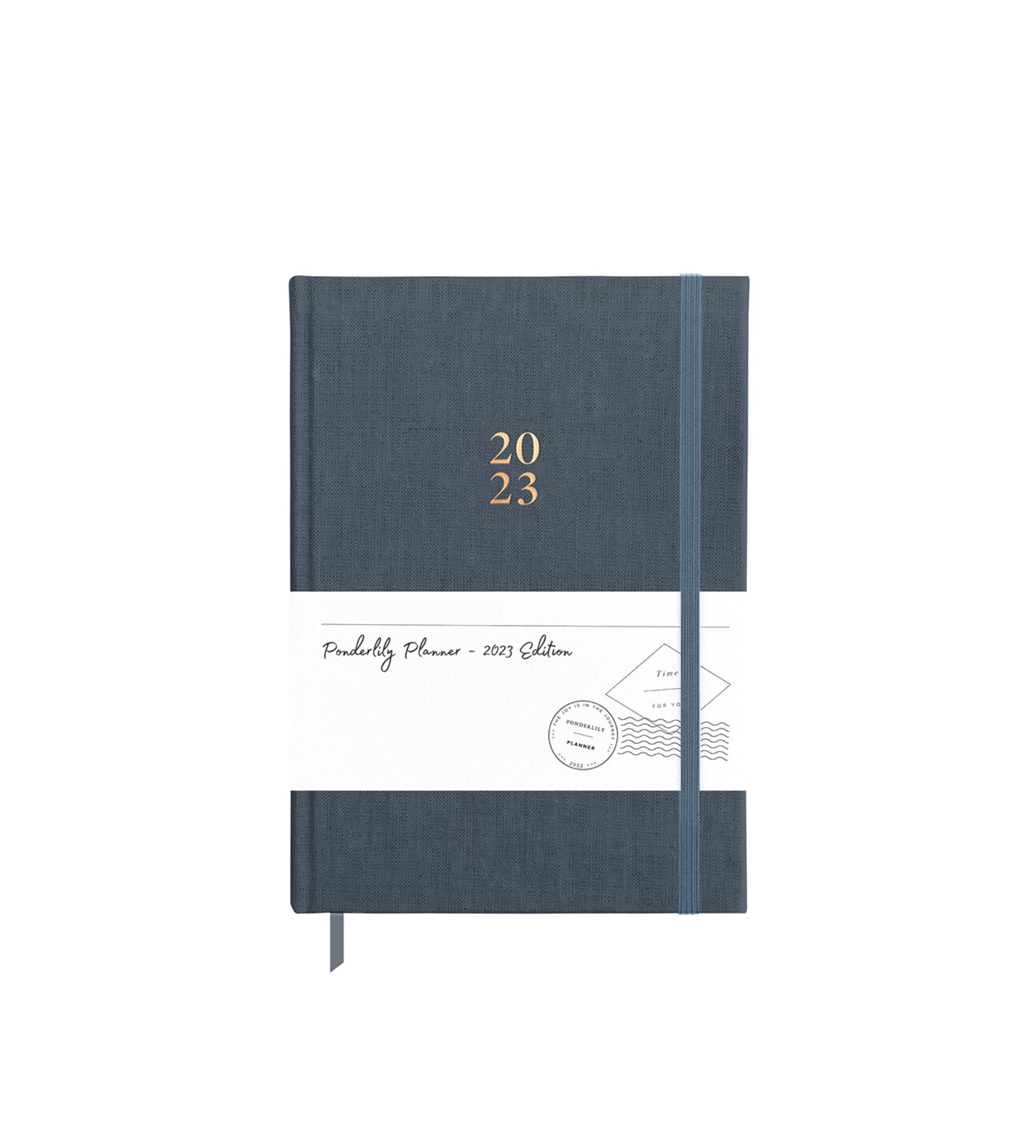 Ponderlily Weekly Planner 2023 in Midnight Blue with copper foil lettering, showcasing its elegant design and eco-friendly materials.