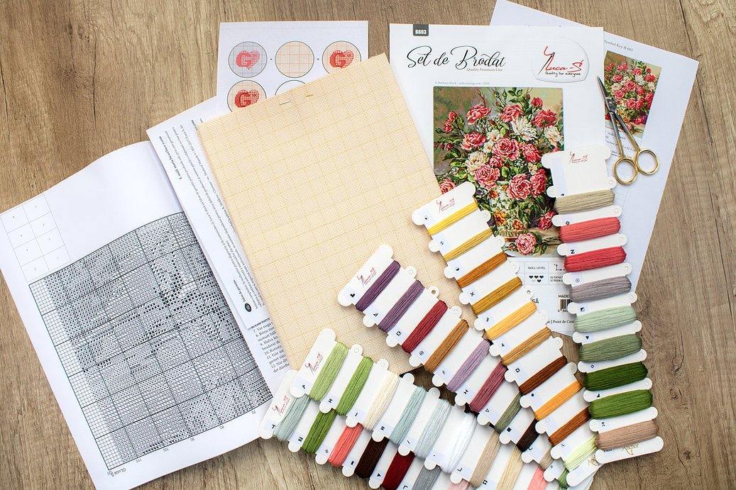 Posies for the Princess B603L Counted Cross-Stitch Kit featuring Aida canvas, colorful threads, and needle for crafting.