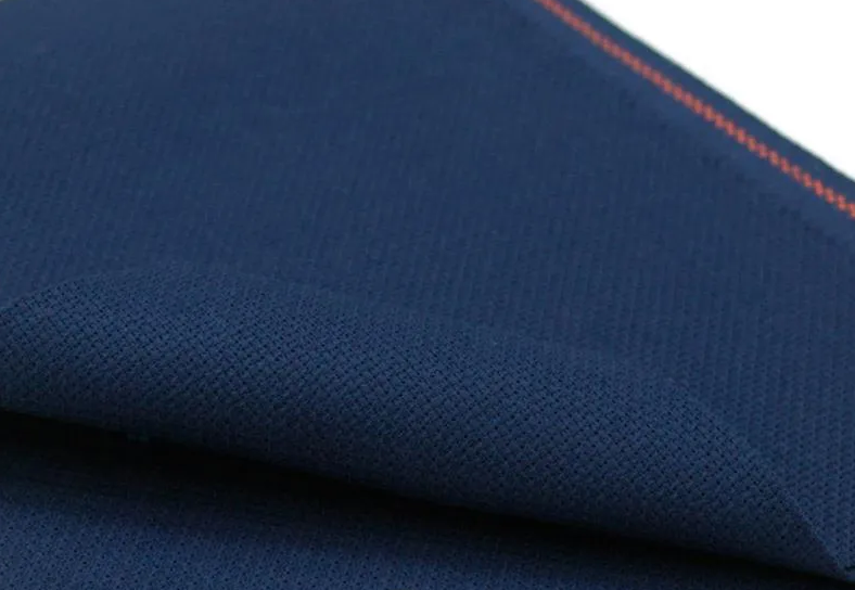 Precut Zweigart Aida 3251/589 fabric in navy blue, showcasing its texture and color.