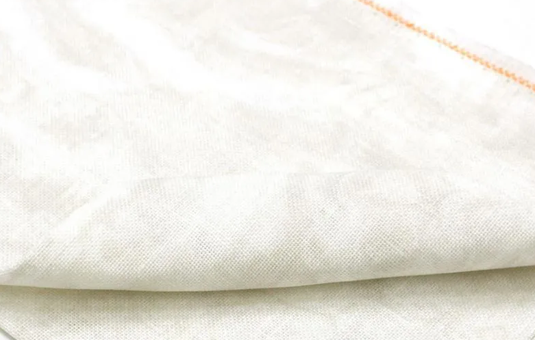 Precut Zweigart Belfast Vintage 3609/1079 fabric in Vintage Dune color, showcasing its soft texture and 32 count weave.