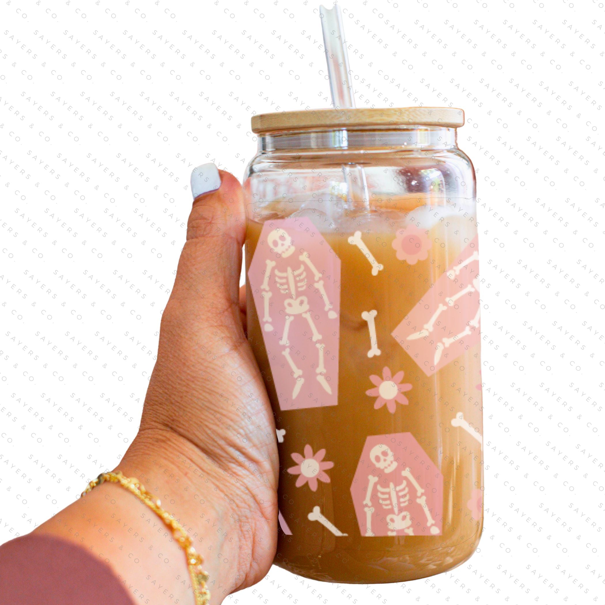 Cute Halloween sublimation transfer featuring silly skeletons and coffins for custom cup designs.