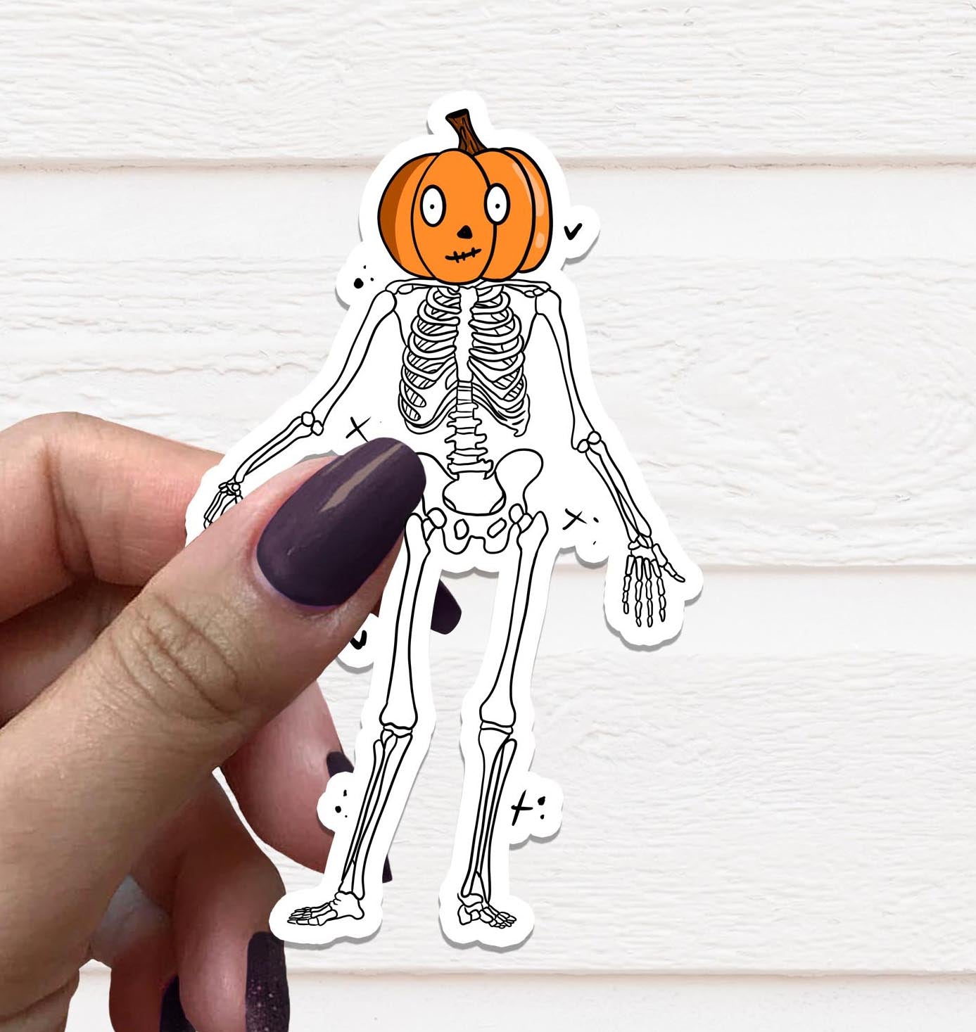Pumpkin Head Skeleton Vinyl Sticker featuring a spooky pumpkin skull design on a matte finish.