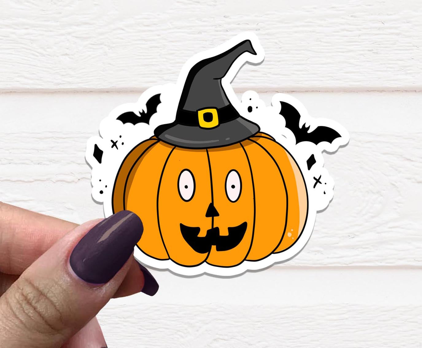 A vibrant Pumpkin Witch Vinyl Sticker featuring a whimsical design of a witch with a pumpkin, perfect for decorating various items.