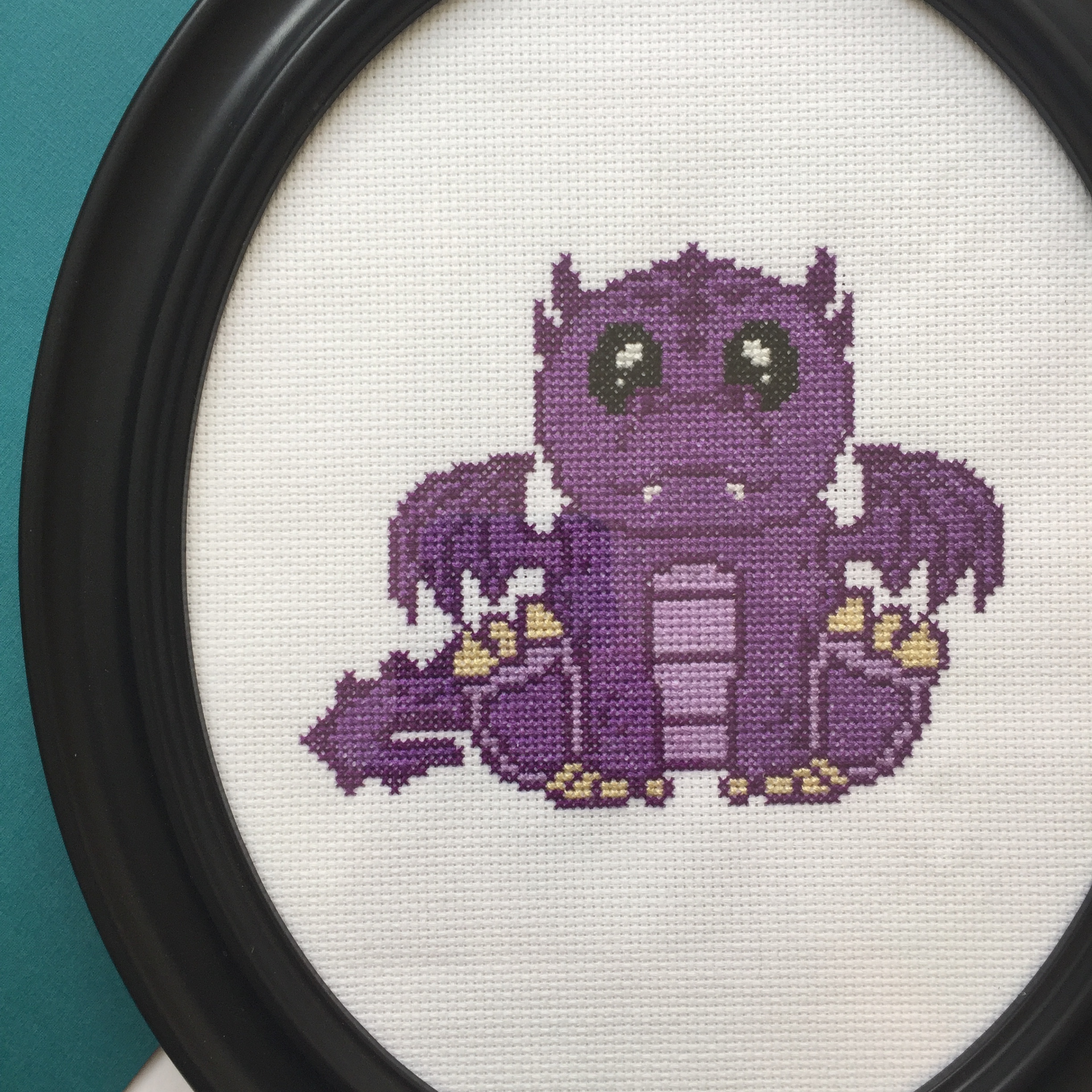 Purple Dragon Counted Cross Stitch DIY Kit with supplies and design pattern.