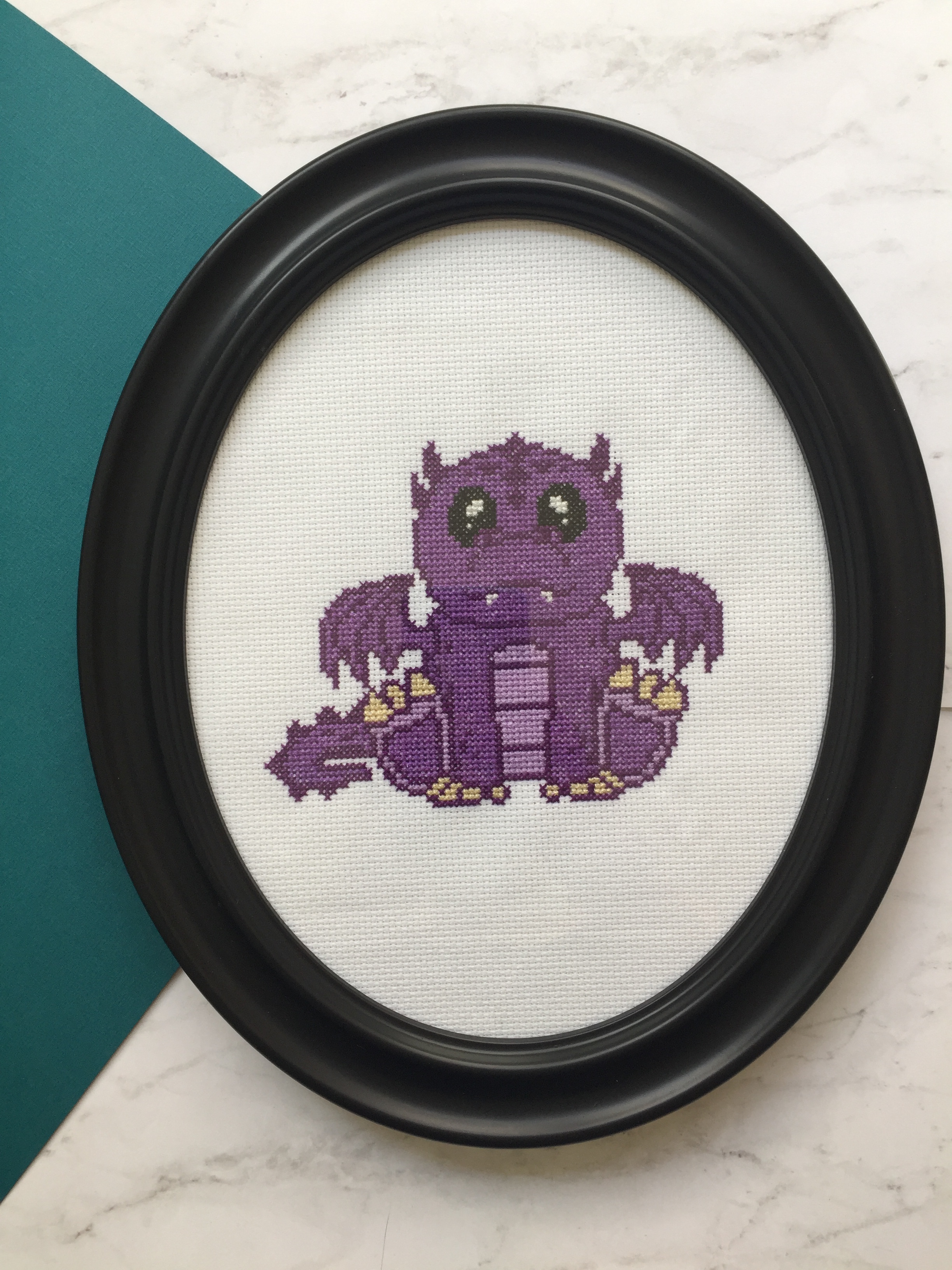 Purple Dragon Counted Cross Stitch DIY Kit with supplies and design pattern.