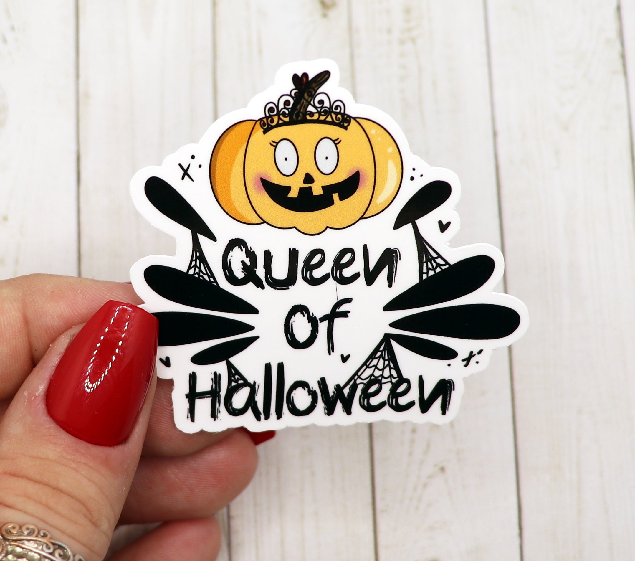 Queen of Halloween Vinyl Sticker featuring a spooky design, perfect for personalizing items like water bottles and laptops.